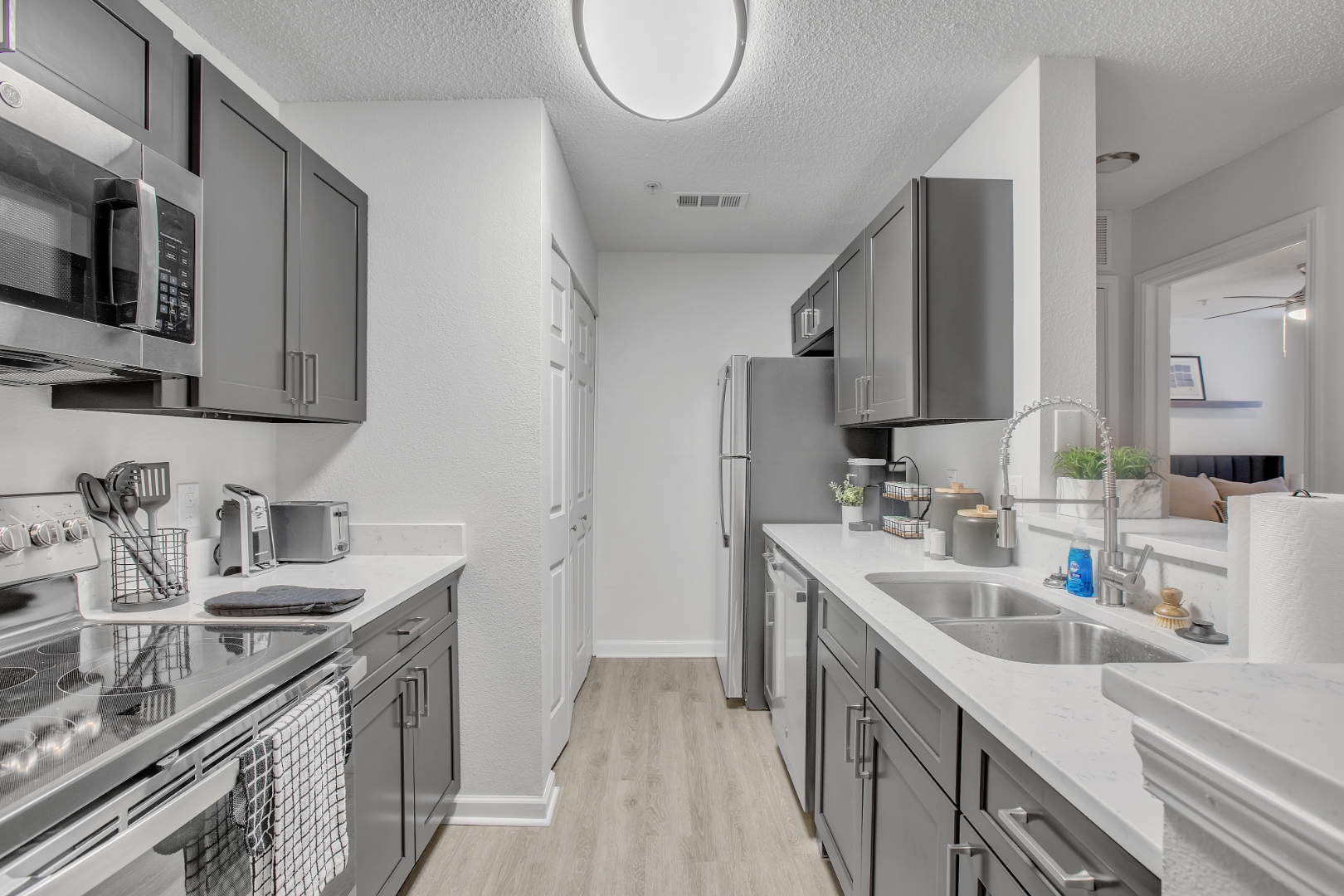 Kitchen with gray shaker cabinets
